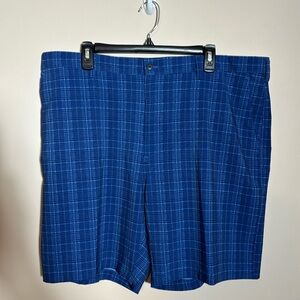 Men’s PGA Tour golf shorts. Blue plaid. Poly/elastane stretch material.